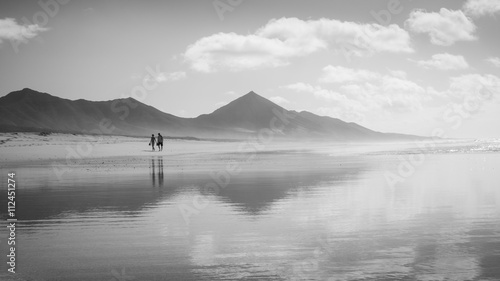 Beach walkers at Cofete - Fuerteventura; Canary Islands