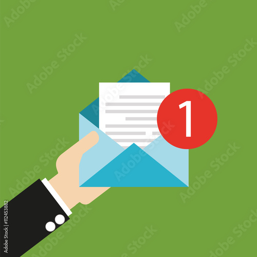 Email message concept. New, incoming message. Hand holding letter