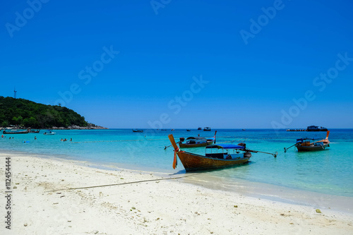 fishing boat against clear sea and blue sky © tanasan