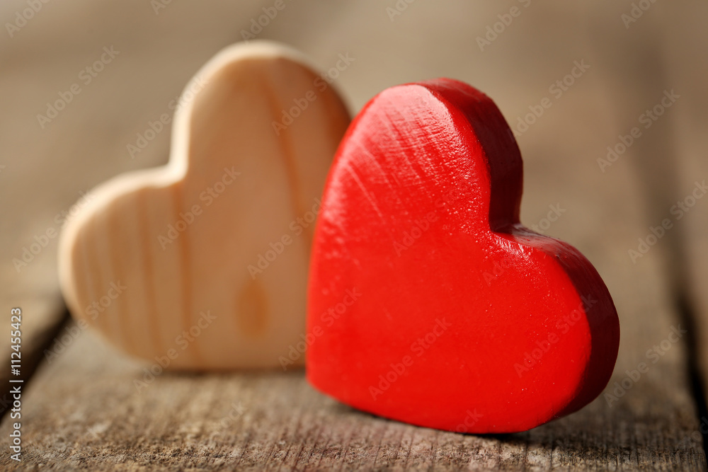 Wooden hearts on rustic wooden background Wooden hearts on rustic wooden background