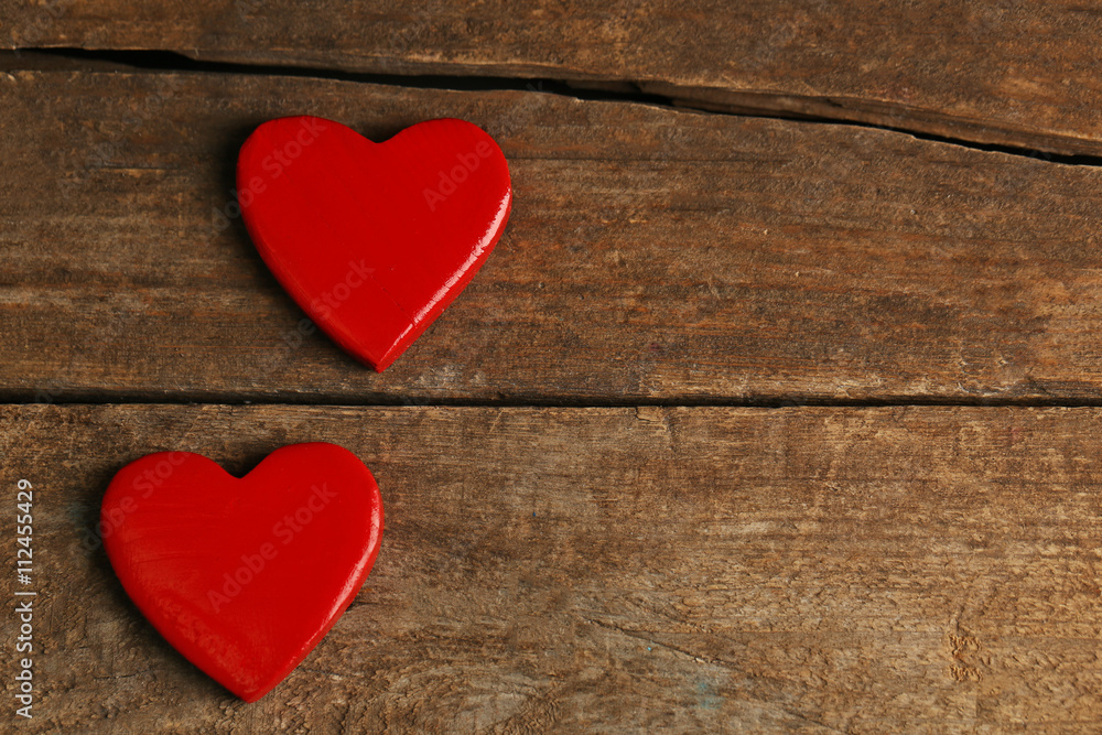 Wooden hearts on rustic wooden background Wooden hearts on rustic wooden background