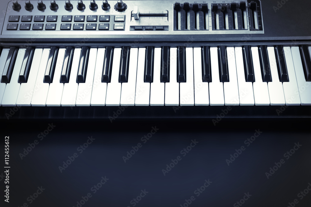 Fototapeta premium Keyboard of synthesizer closeup
