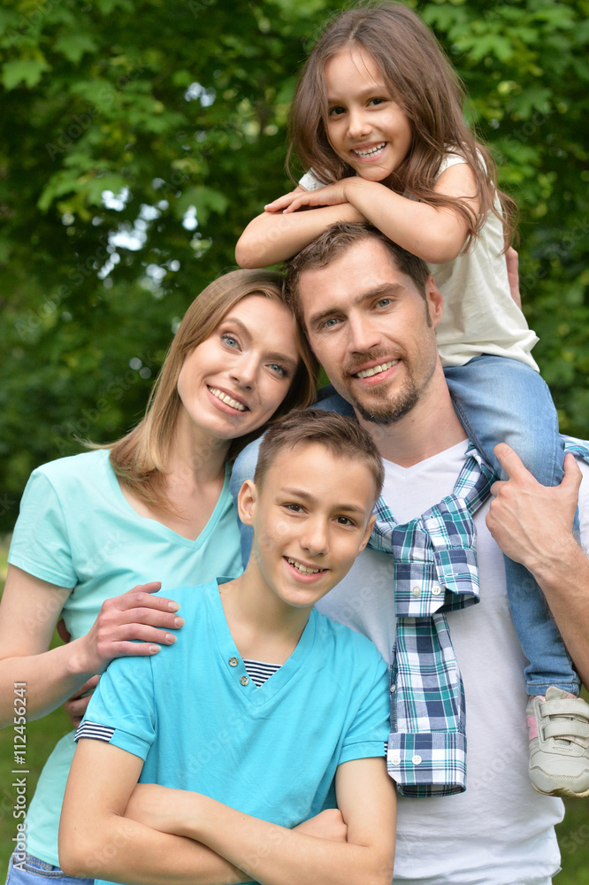 happy family in park happy family in park