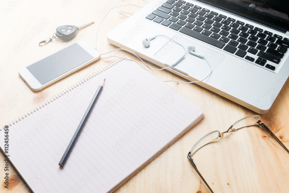 blank notebook with pencil and laptop blank notebook with pencil and laptop