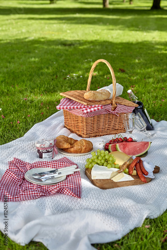 Healthy picnic food with fruit, cheese and bread