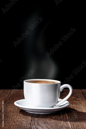 cup of coffee on a wooden