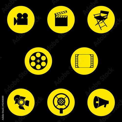 Vector. A set of cinematographic icons. Movie maker's accessories. Graphic isolated illustration. Director's chair, camera, cut, tape, speaker, microphone, projector.