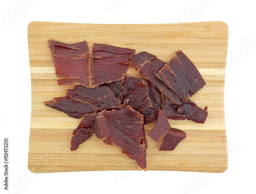Hardwood smoked beef jerky on a cutting board