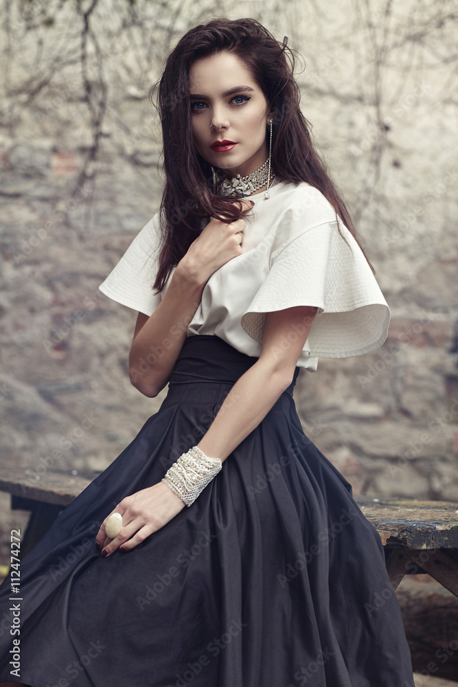 Portrait of a girl model in a beautiful dress. Portrait of a girl model in a beautiful dress.