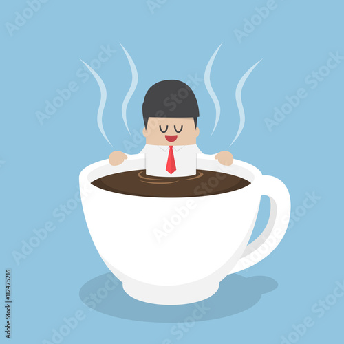 Businessman relaxing in a cup of coffee
