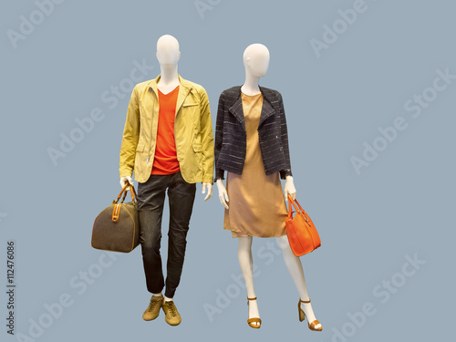 Two mannequins dressed in casual clothes.