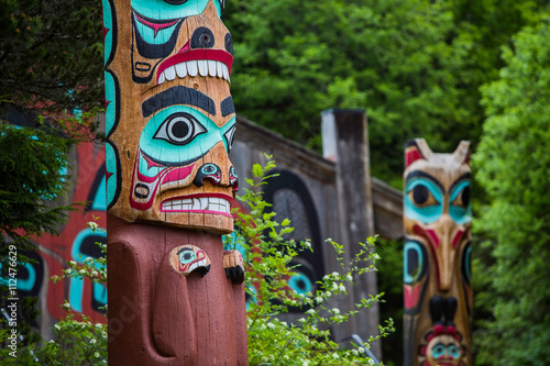 Totem Poles Near Saxman Tribal House photo