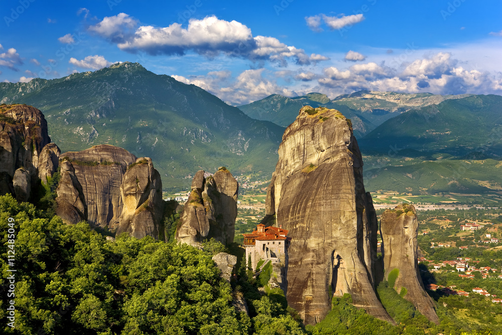 Greece. Meteora - incredible sandstone rock formations rise from the ground and the monasteries on the top of rocks. The Holly Monastery of Rousanou. The Meteora area is on UNESCO World Heritage List - obrazy, fototapety, plakaty 