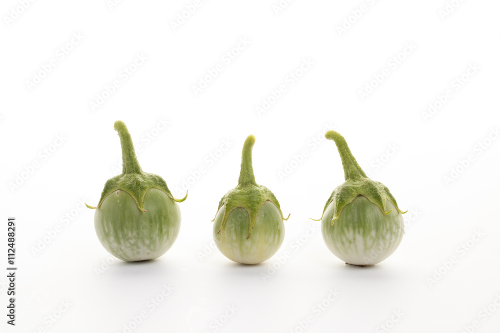 green eggplant with drops of water on White background green eggplant with drops of water on White background
