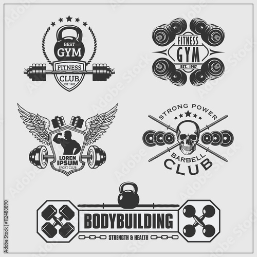 Set of gym emblems, labels, badges and logos.