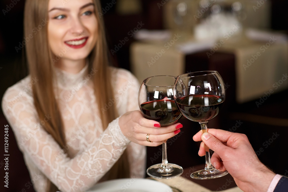 Couple toasting wineglasses