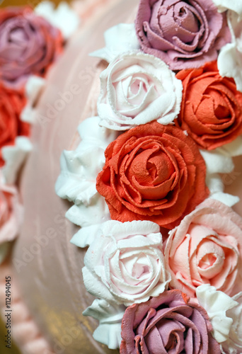 Birthday cake with red roses.