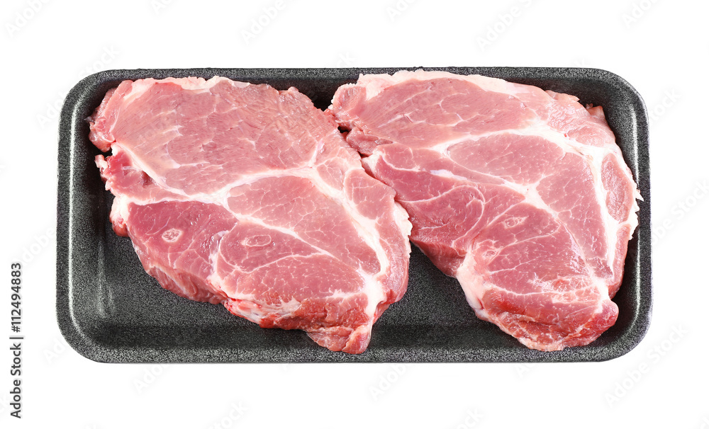 Packed pieces of pork meat, isolated on white Packed pieces of pork meat, isolated on white