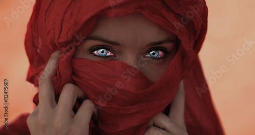 Blue eyes arabic woman photo