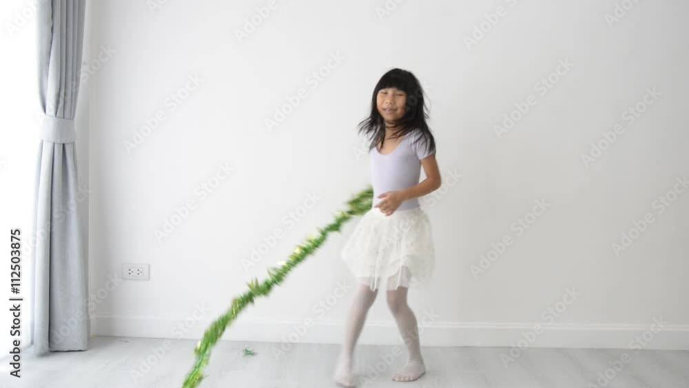 Slow motion girl spinning and jumping at home Slow motion girl spinning and jumping at home