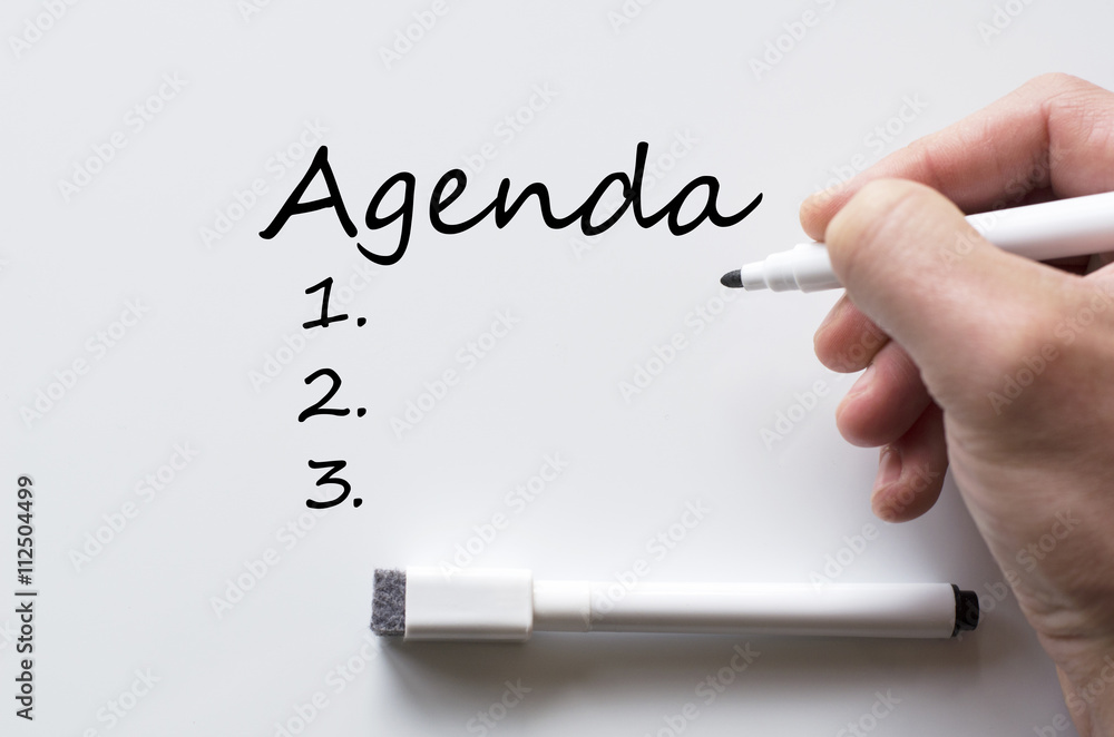 Agenda written on whiteboard Agenda written on whiteboard
