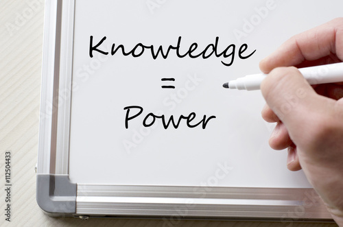 Knowledge and power written on whiteboard