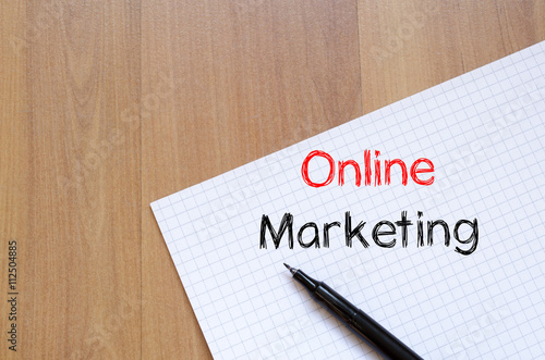 Online marketing write on notebook