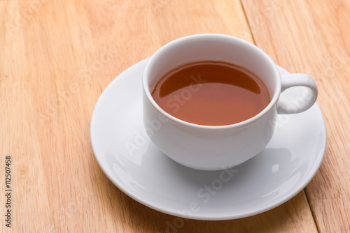 Cup of tea on wooden, closeup