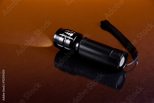 LED flashlight in backgroun © remore