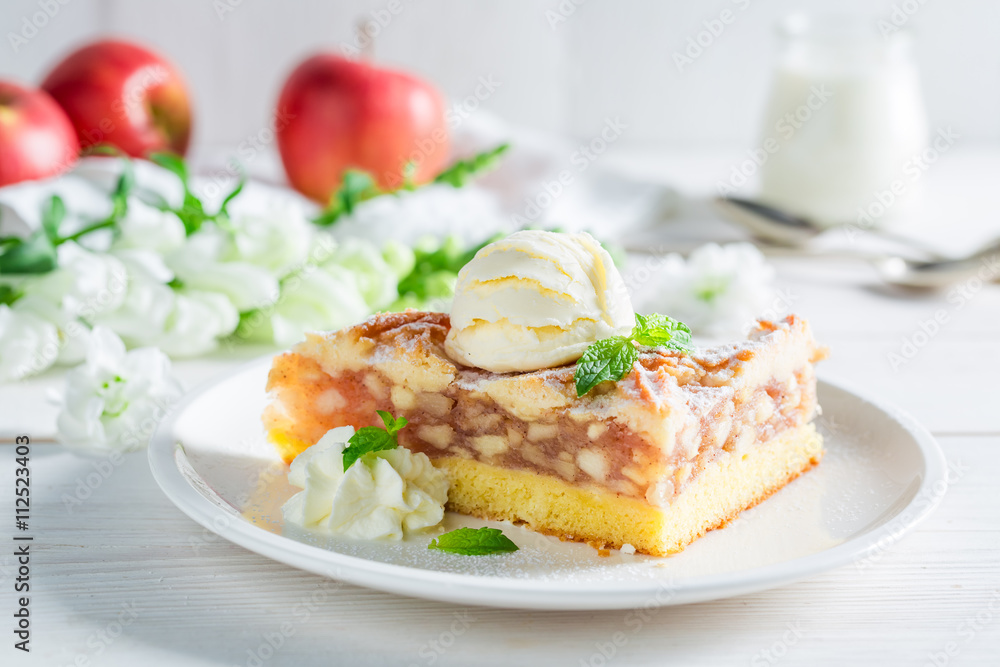 Homemade apple pie and ice cream with mint leaves