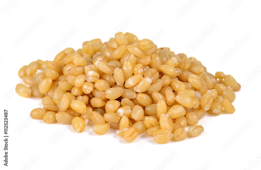 pile of pearl barley isolated on a white background.