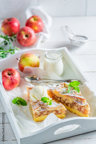 Homemade wanilla ice cream and apple pie with mint leaves photo