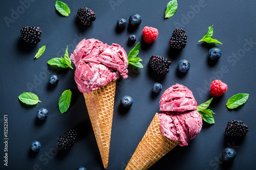 Homemade ice cream with berry fruits in waffels