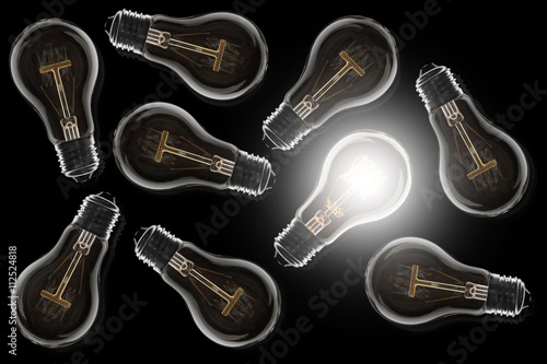 Idea concept -   light bulb on the black background