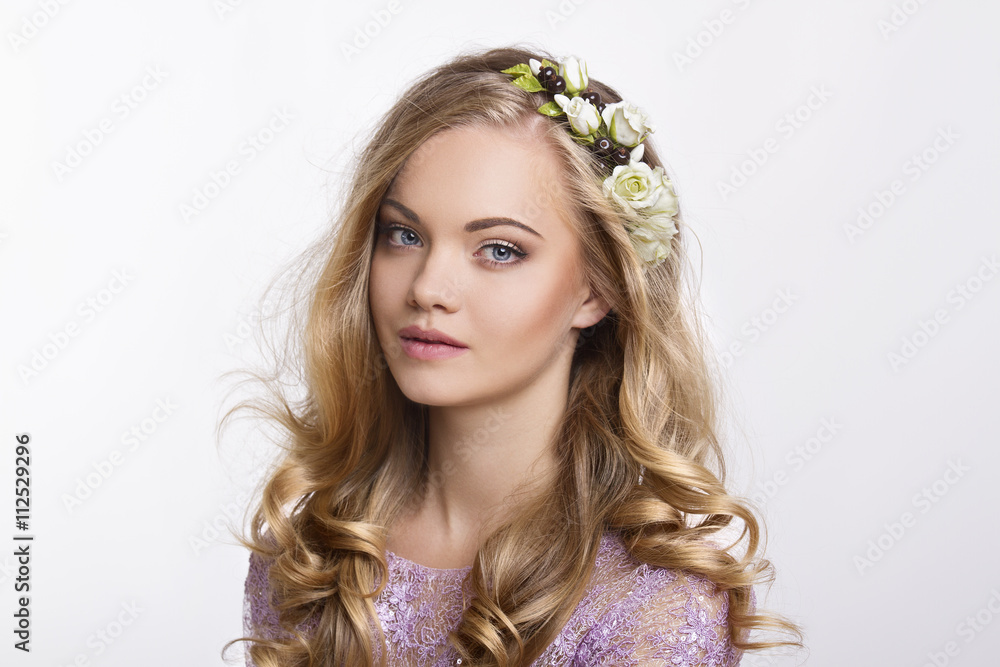 Naklejka premium Beautiful woman portrait with flowers on head and perfect makeup. Beauty fashion.