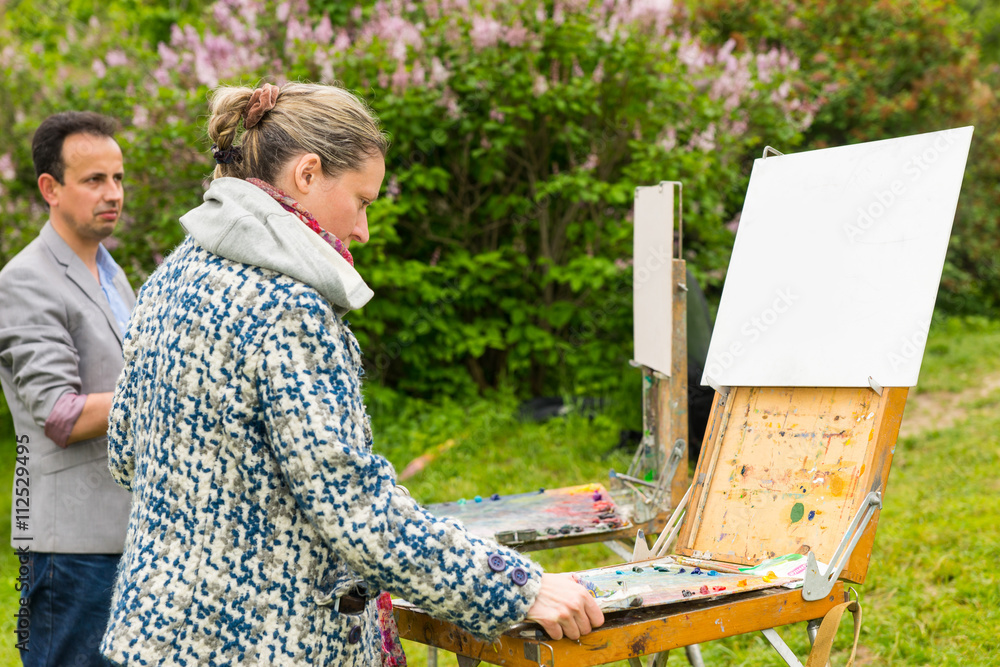 Naklejka premium Couple Of Artists In The Open Air