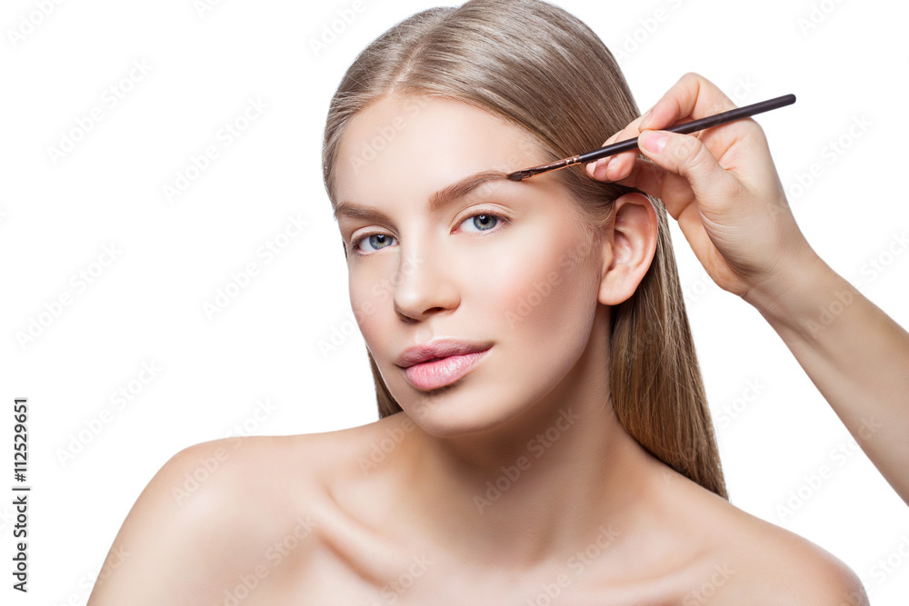 Woman correcting eyebrows form Woman correcting eyebrows form