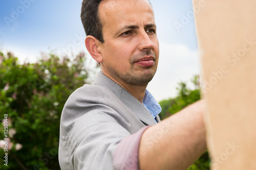 Portrait of a handsome middle-aged pensive male painter