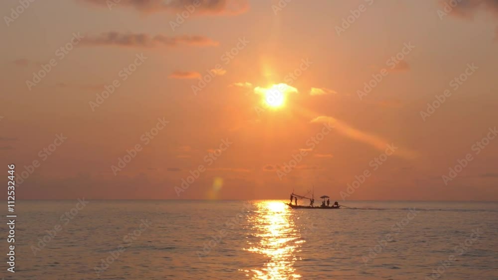 Fishing Boat with Fisherman Sailing at Sunset in Sea. Fishing Boat with Fisherman Sailing at Sunset in Sea.