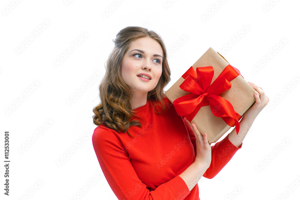 Joyful woman holding a box with gift Joyful woman holding a box with gift