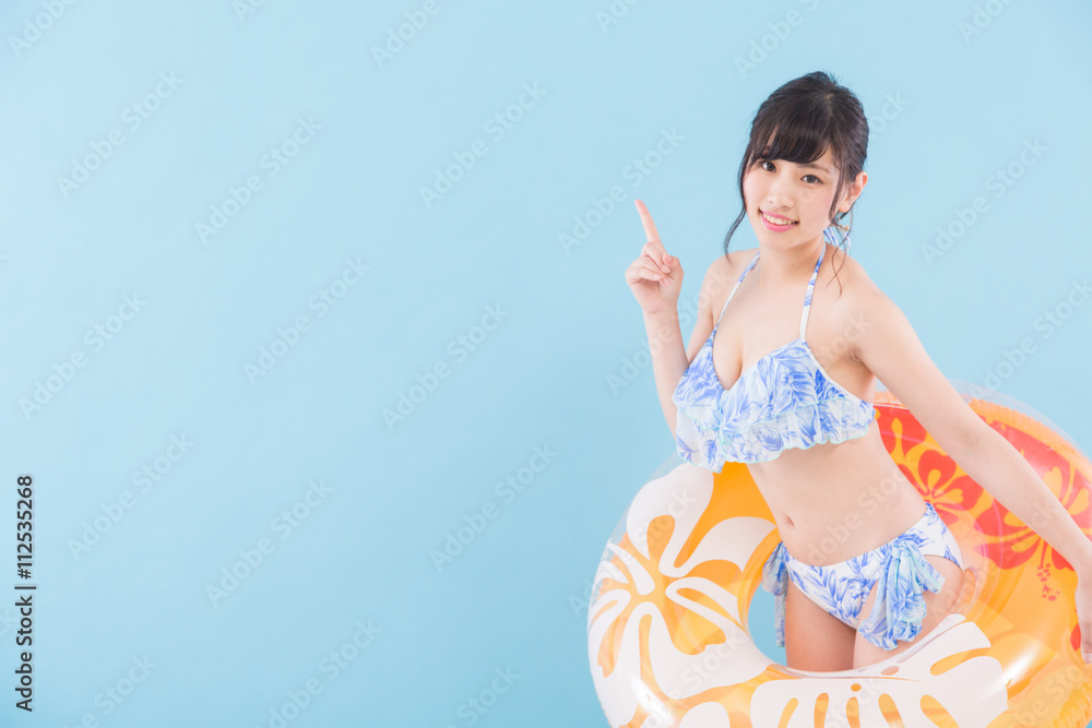 ポーズをする水着女性Stock Photo | Adobe Stock