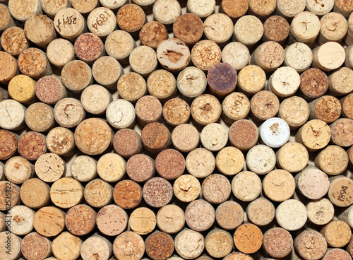 Background of used wine corks, wall of many different wine corks closeup