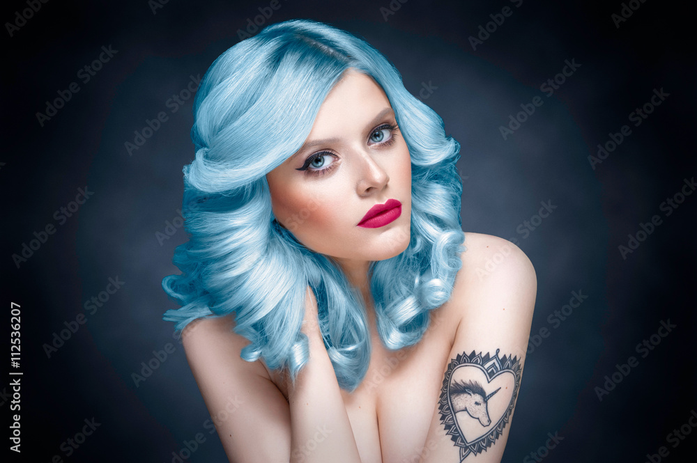 Studio beauty portrait of a girl with blue hair Studio beauty portrait of a girl with blue hair