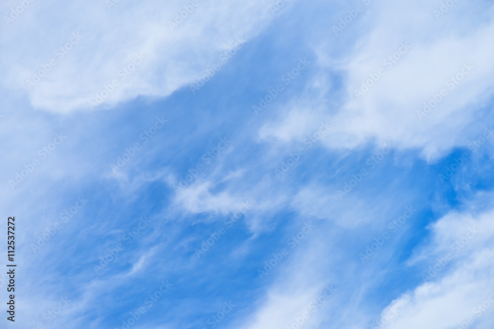 White fluffy clouds with blue sky
