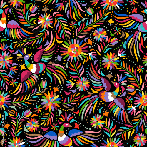 Mexican embroidery seamless pattern. Colorful and ornate ethnic pattern. Birds and flowers dark background. Floral background with bright ethnic ornament.