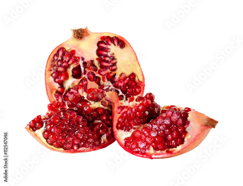 Ripe pomegranate fruit isolated on white background. Selective focus
