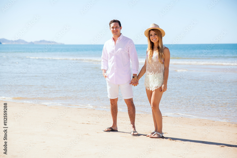Hispanic young couple at the beach Hispanic young couple at the beach