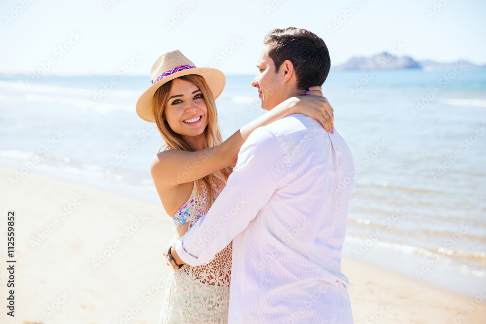Beautiful woman with her boyfriend at the beach Beautiful woman with her boyfriend at the beach