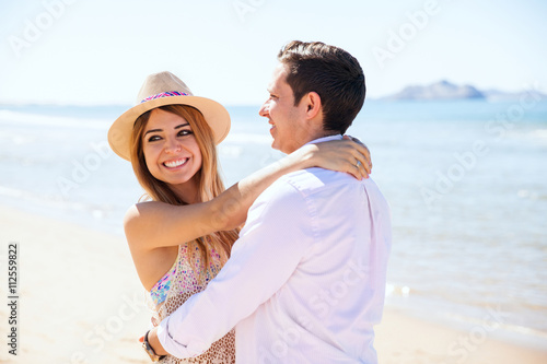 Young couple during a date at the beach