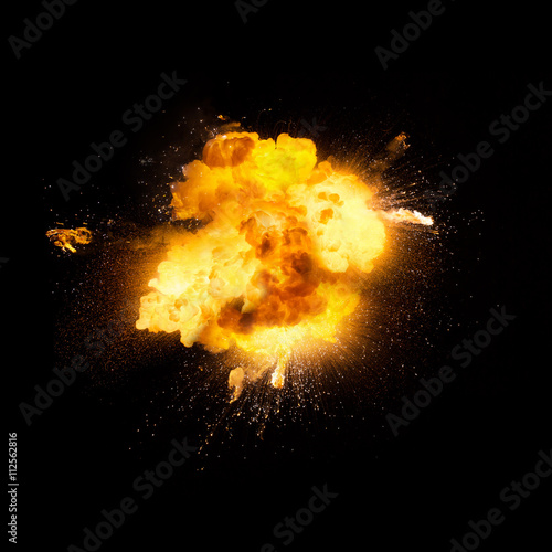 Realistic fiery explosion over a black background